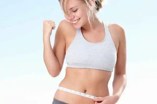 woman happy after fat reduction treatment Greater London (Greenwich)